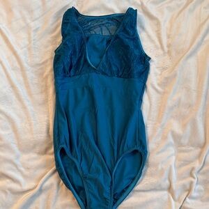 Teal leotard with lace back.
